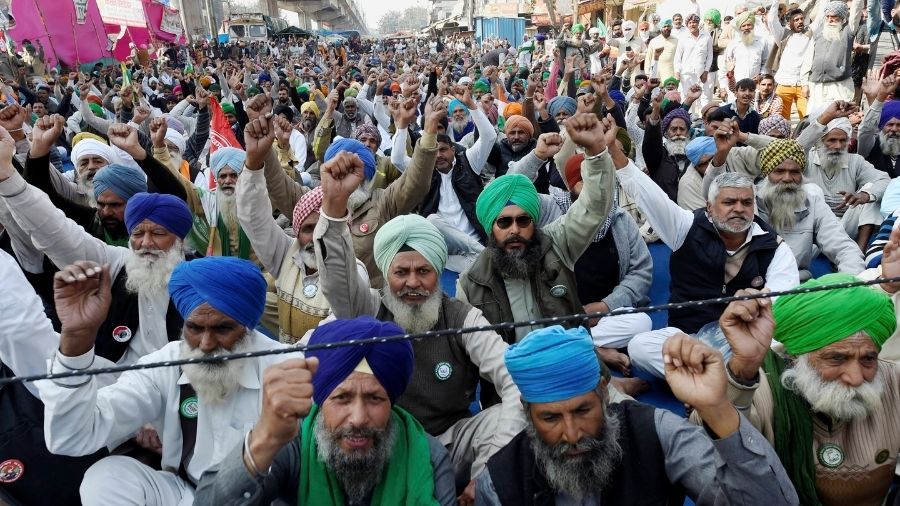 Farmers demonstrate at the Tikri border on Saturday.