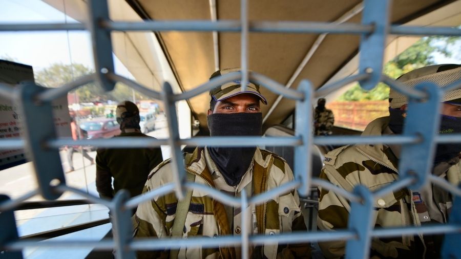 Security personnel guard the Lal Quila Metro Station in New Delhi, which was closed during Saturday's protest, owing to the violence that broke out at Red Fort on January 26.