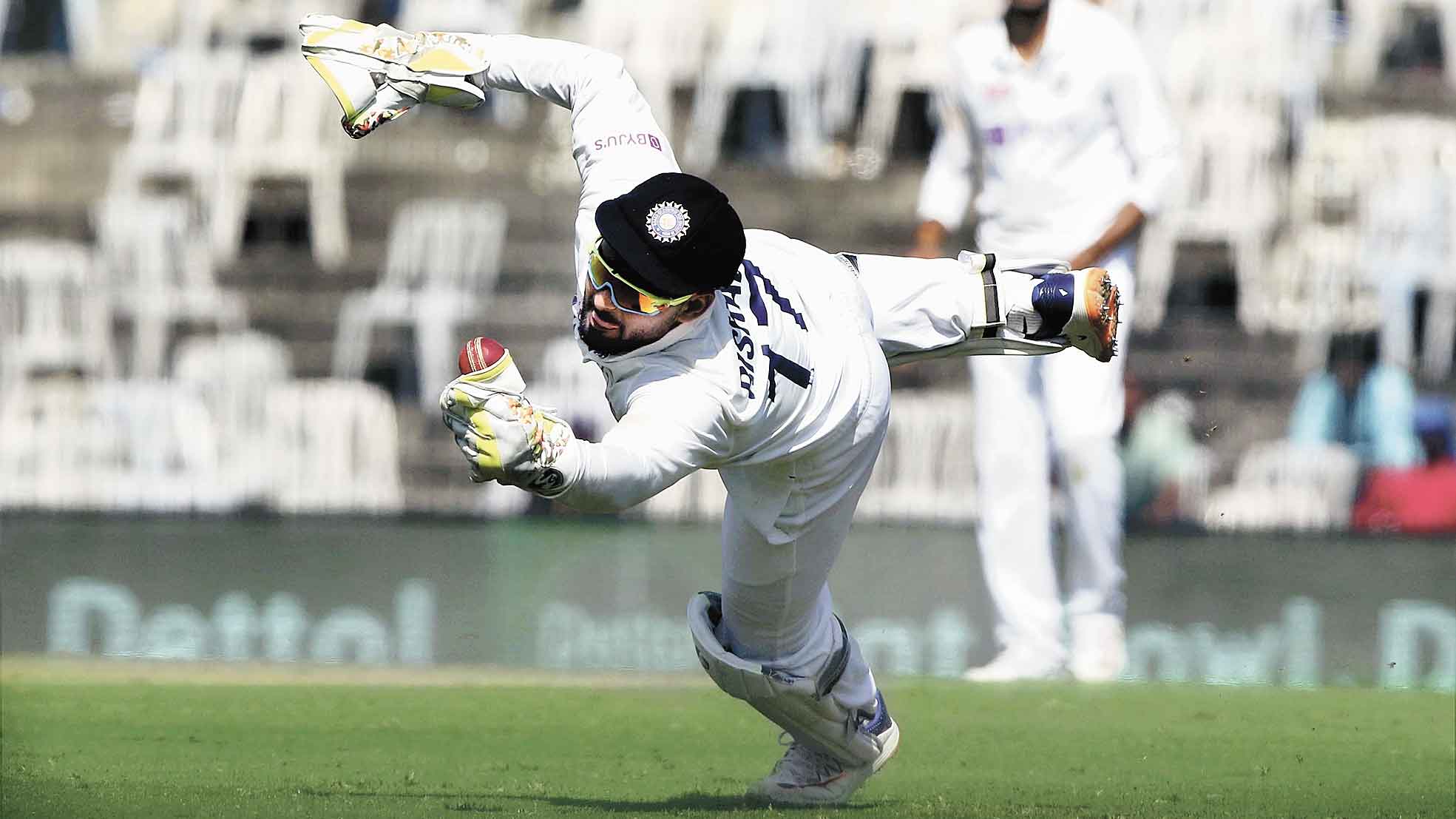FLYING MACHINE: Rishabh Pant takes a diving catch to dismiss Ollie Pope on the second day of the second Test on Sunday.