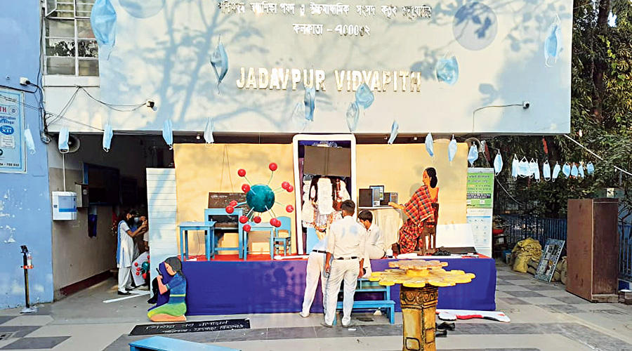 Students at Jadavpur Vidyapith set up models of smartphones and computers for Saraswati Puja.