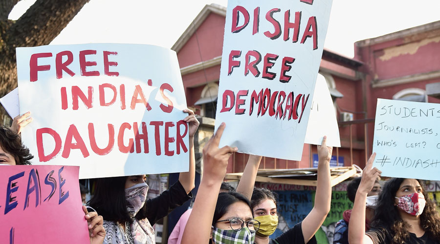 Members of various social organisations protest Disha’s arrest in Bangalore on Monday. 
