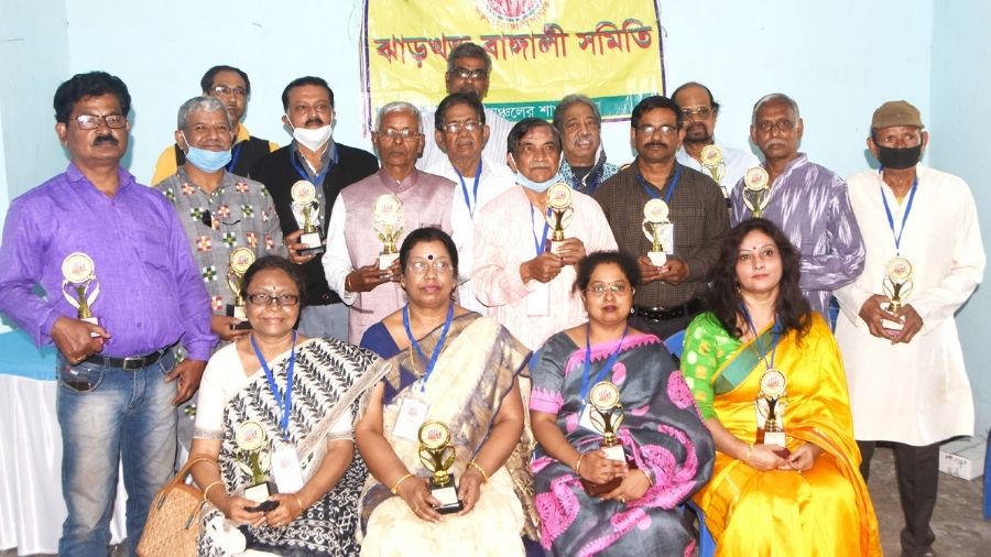 Felicitated language rights activists during the event at Lindsay Club in Dhanbad on Sunday. 