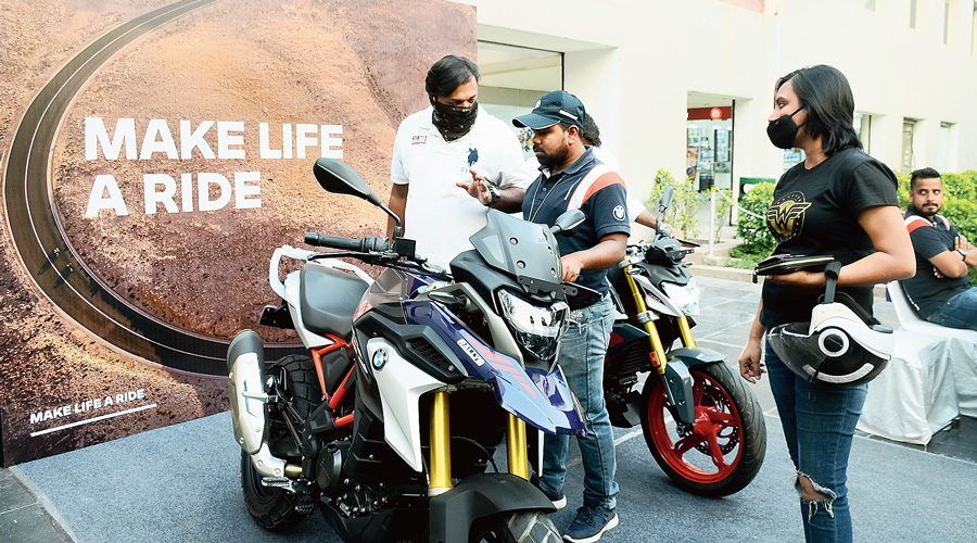 People check out bikes at the Weekend Auto Carnival on Sunday.