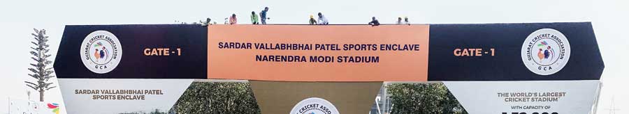 The writing above a gate at Motera reads Sardar Vallabhai Patel Sports Enclave and Narendra Modi Stadium. 