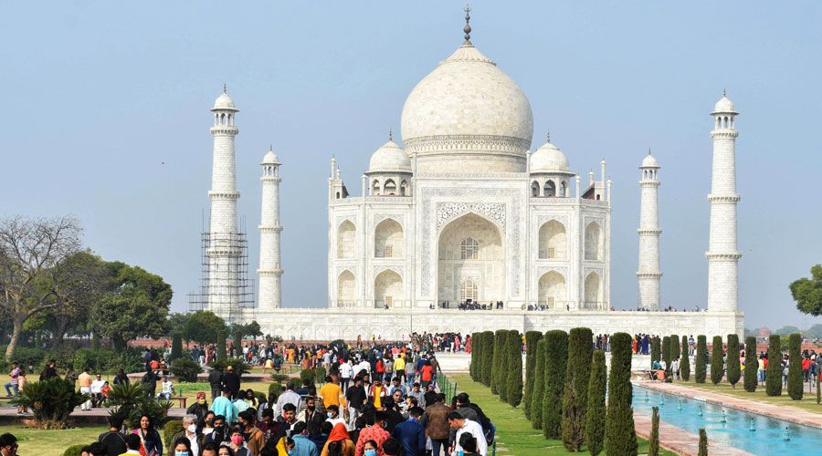 Tourists visit Taj Mahal amid coronavirus pandemic, in Agra on Sunday, Dec. 27, 2020. (