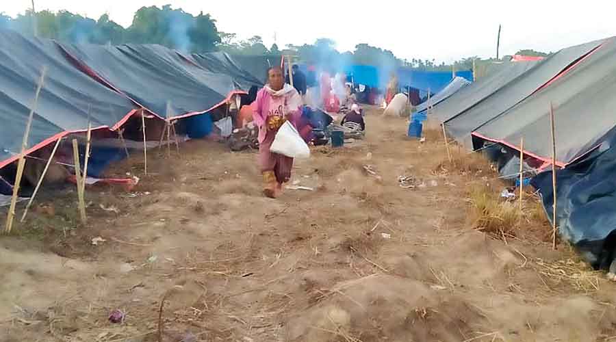 Villagers at the makeshift camps near the Tinsukia DC office