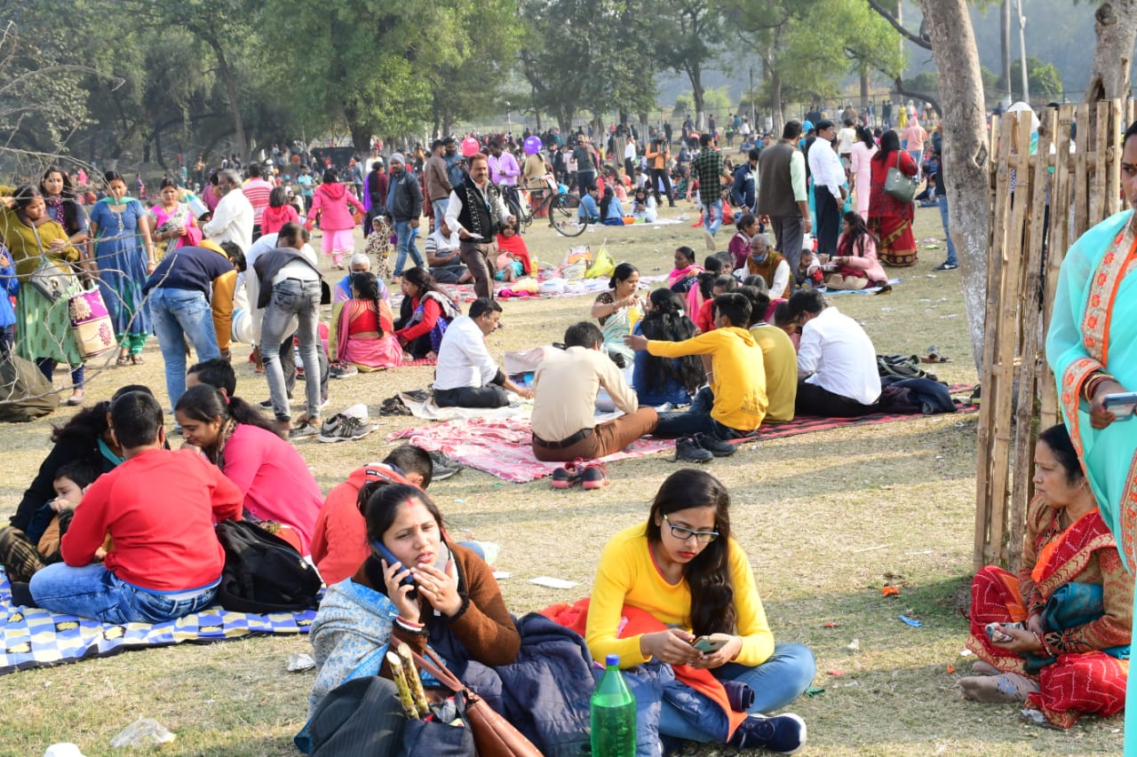 Picnickers enjoy New Year's Day at City Park in Bokaro township on Friday.