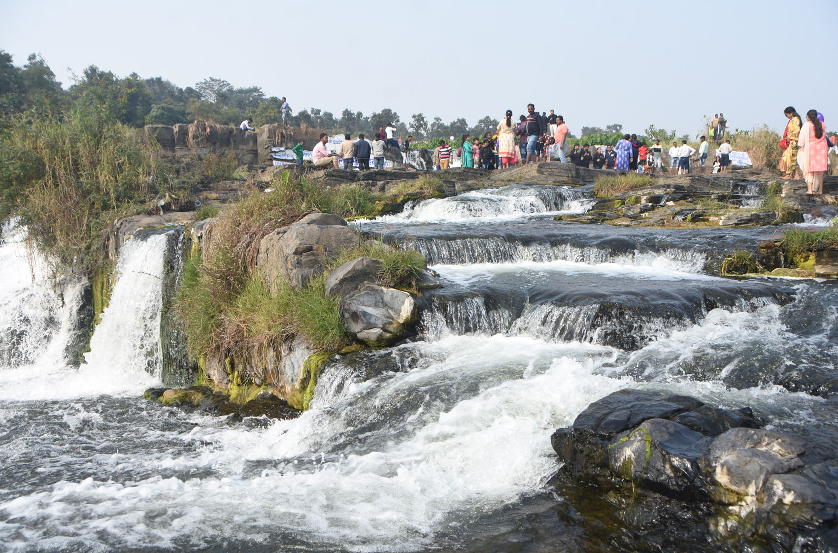 Picnickers enjoy scenic beauty at the Bhatinda Falls in Moonidih, Dhanbad, on Friday.