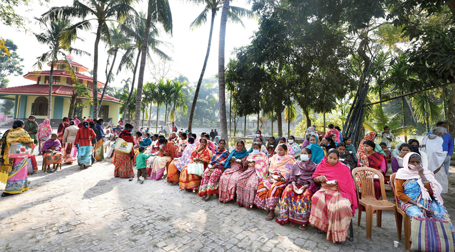 The recipients are served snacks after the distribution drive.