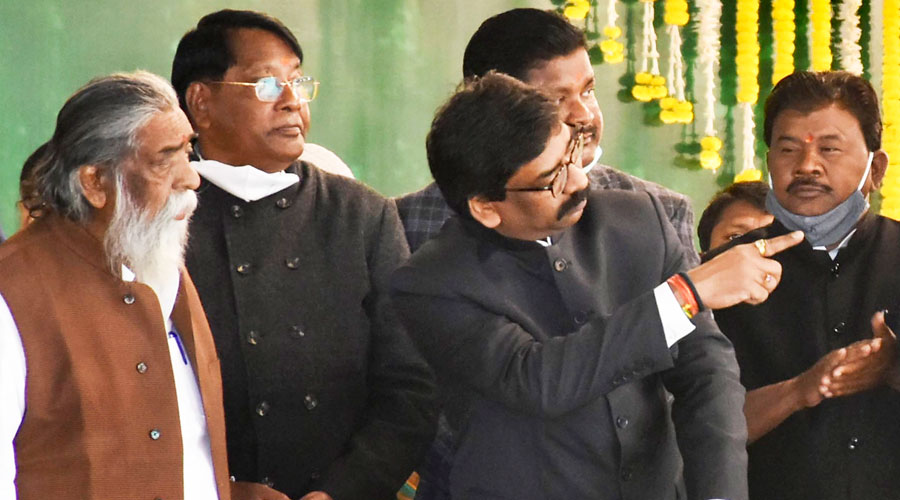 Jharkhand Chief Minister Hemant Soren, with JMM Supremo Shibu Soren and Jharkhand Congress in-charge RPN Singh and other dignitaries during foundation laying stone of various development projects on completion of his one year by their government, in Ranchi on Tuesday, Dec. 29, 2020. (