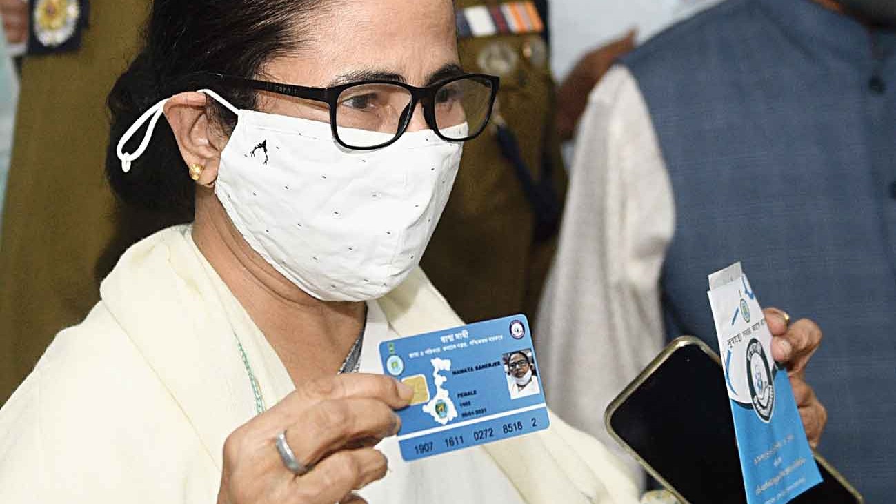 Chief minister Mamata Banerjee displaying her Swasthya Sathi card