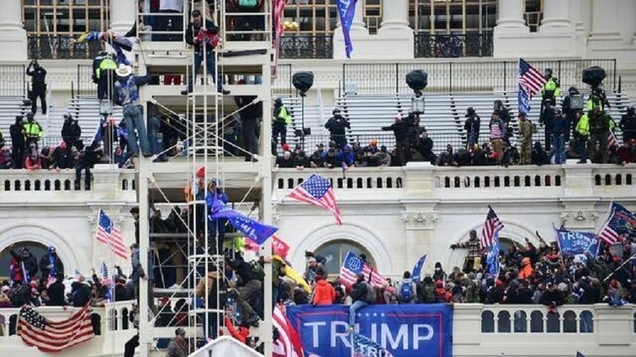 Multiple news outlets showed protestors walking with ease inside the Capitol and hundreds of them occupying the inaugural stage. A large number of them were seen climbing the wall.