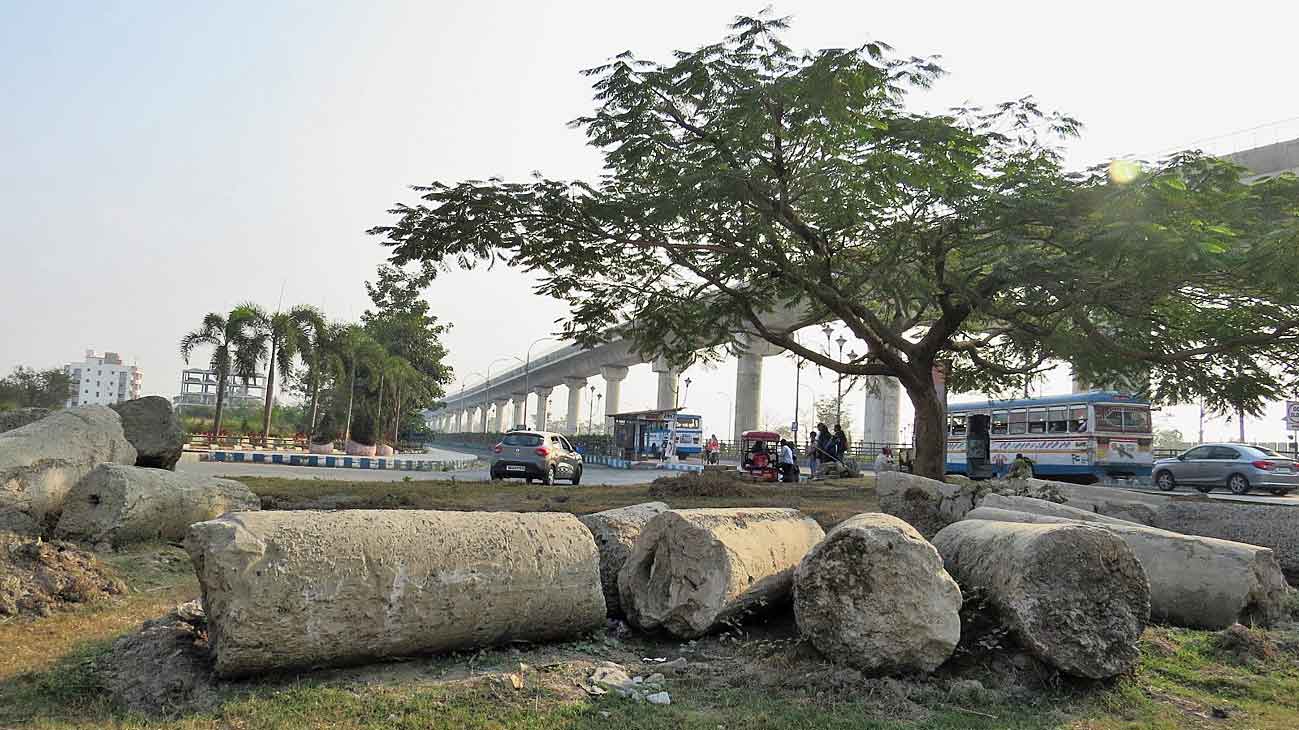 Concrete pillars lie by the wayside.