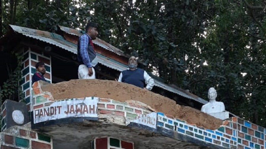 The damaged guard wall where bust of Pandit Jawaharlal Nehru was placed