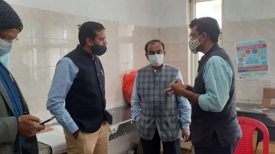 Deputy commissioner Chhavi Ranjan (wearing a black mask) inspects the vaccination centre at Sadar hospital in Ranchi on Monday night. 