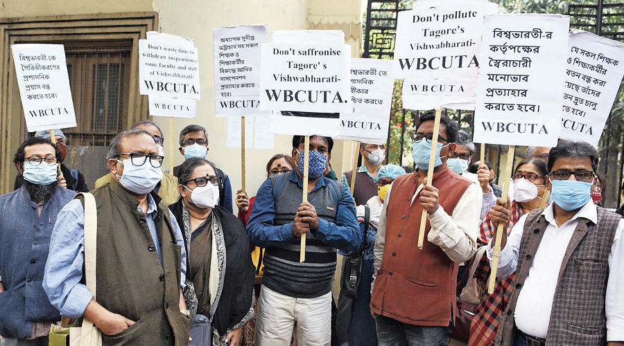 Teachers protest in front of Visva-Bharati’s office in Beckbagan on Wednesday. 