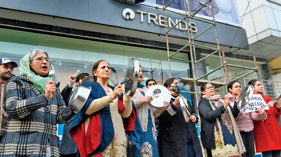 Utensils being clanged in front of a Reliance Trends  store in Jalandhar last month in support of the  farmers’ agitation. 