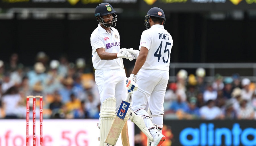 Rohit Sharma and Cheteshwar Pujara during India's innings, in Brisbane on Saturday.