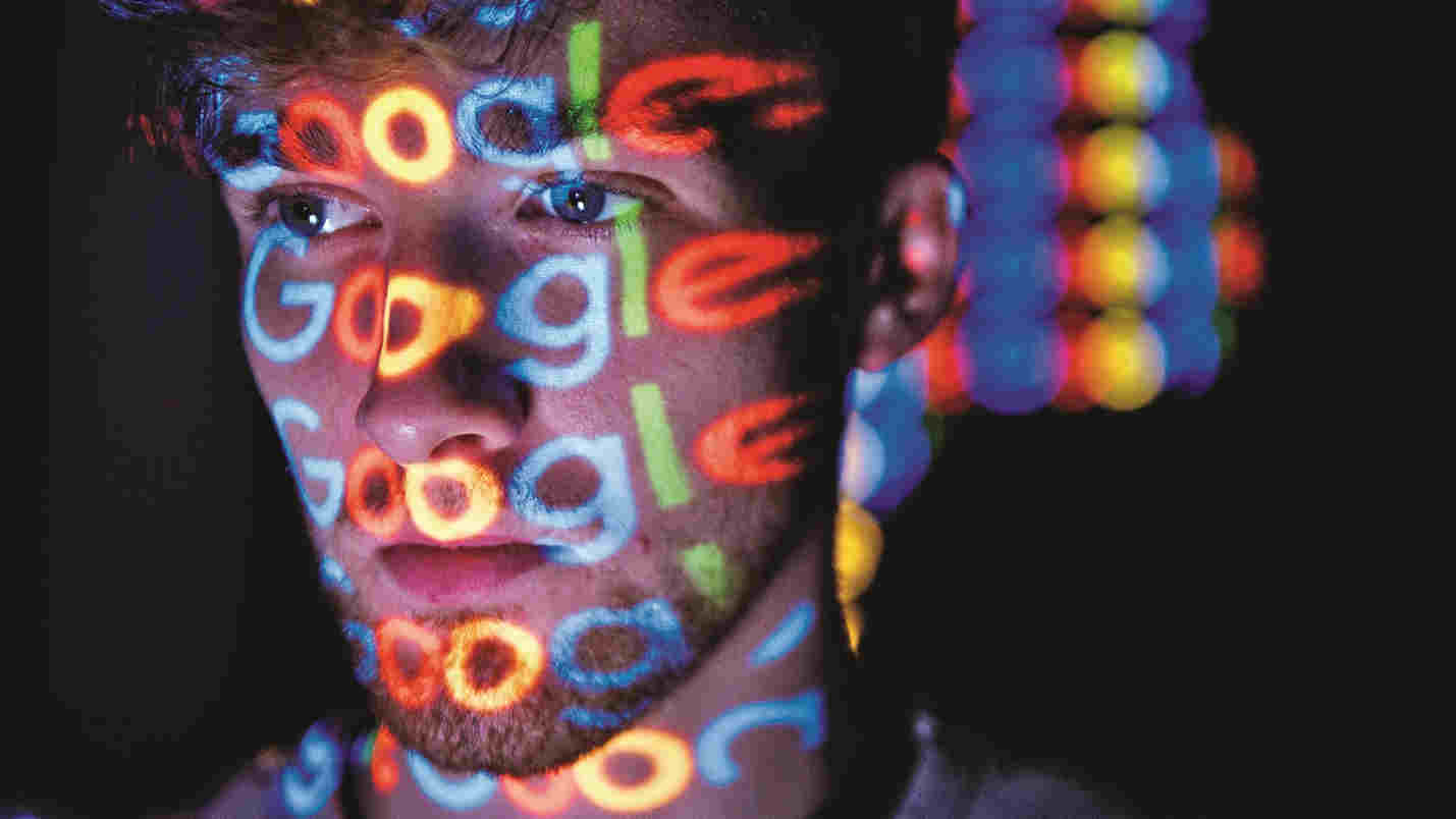 In this photo illustration, The Google logo is projected onto a man on August 09, 2017 in London, England. Founded in 1995 by Sergey Brin and Larry Page, Google now makes hundreds of products used by billions of people across the globe, from YouTube and Android to Smartbox and Google Search.