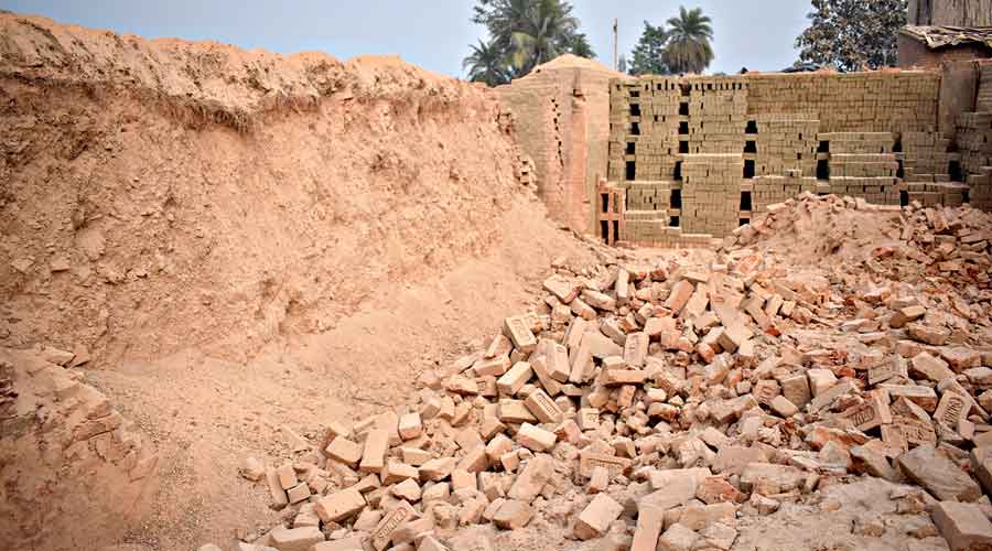 The collapsed stack of bricks inside the pit of the kiln on Sunday