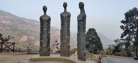 Three abstract figurines that find place on one of the gardens at Taj Chia Kutir to lend dimension to the landscape.
