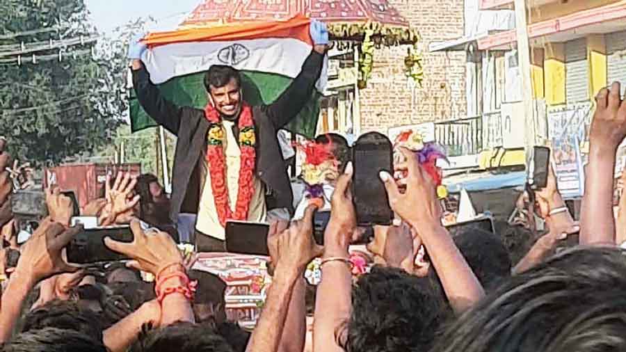 T. Natarajan, during a celebration at his native Chinnappampatti village in Tamil Nadu’s Salem district on Thursday. The fast bowler landed in Bangalore and then drove to his native village. He was accorded a festive welcome, complete with garlands and a chariot ride  through the streets where people gathered in good  numbers to acknowledge the new star.