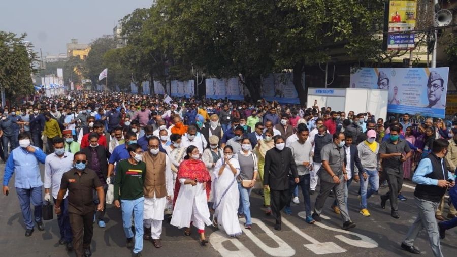 Mamata Banerjee walks at a rally in honour of Netaji Subhas Chandra Bose in Calcutta on Saturday.
