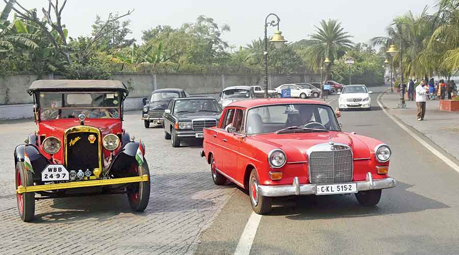 Vintage and classic cars take part in the drive on Sunday. 