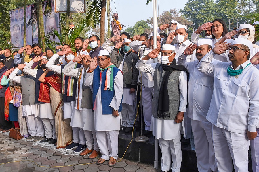 Senior Congress leader Digvijaya Singh hoists the National Flag on the occasion of Republic Day celebration at PCC office in Bhopal on Tuesday.