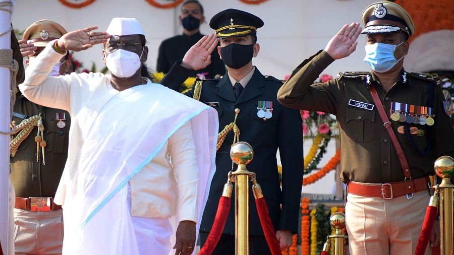 Jharkhand Governor Droupadi Murmu salutes the national flag after unfurling it during the Republic Day celebrations at the Morabadi ground in Ranchi, on Tuesday.