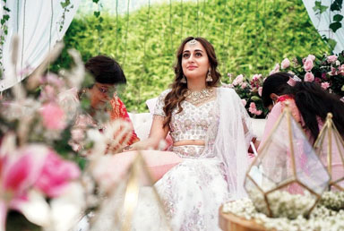 Natasha Dalal in a pastel outfit for her mehendi ceremony