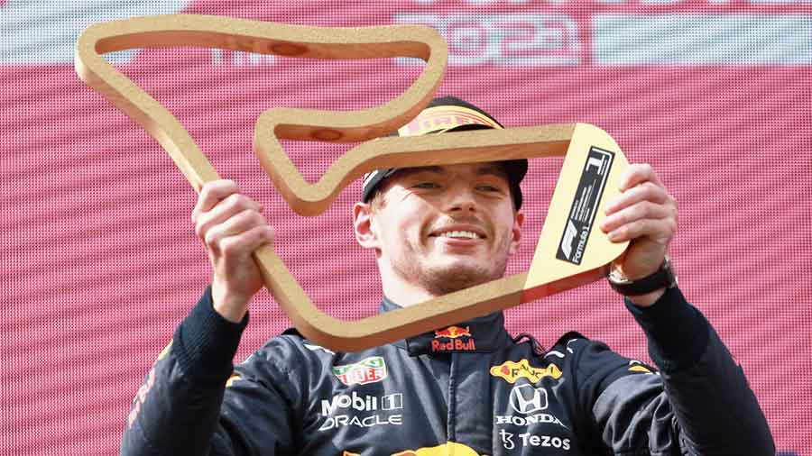 Max Verstappen on the podium after winning the Austrian GP in  on Sunday. 