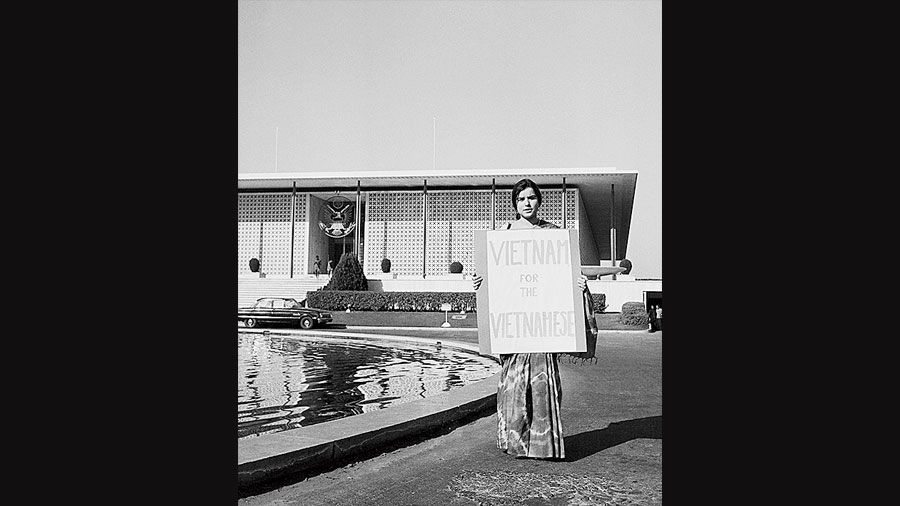 A student demonstration outside the US Embassy in New Delhi, India, protesting against US policy in Vietnam during the Vietnam War, December 1965. The woman is holding up a sign reading 'Vietnam For The Vietnamese'.