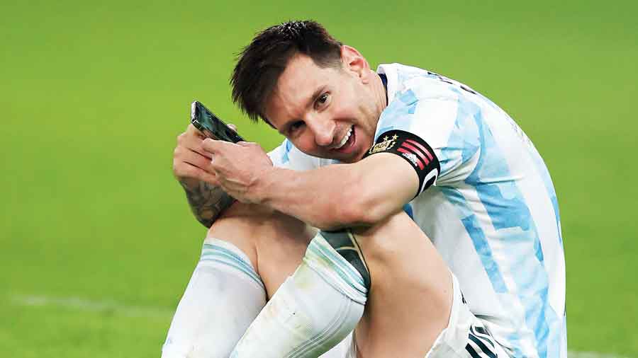 Messi speaks to his family over the phone from the stadium