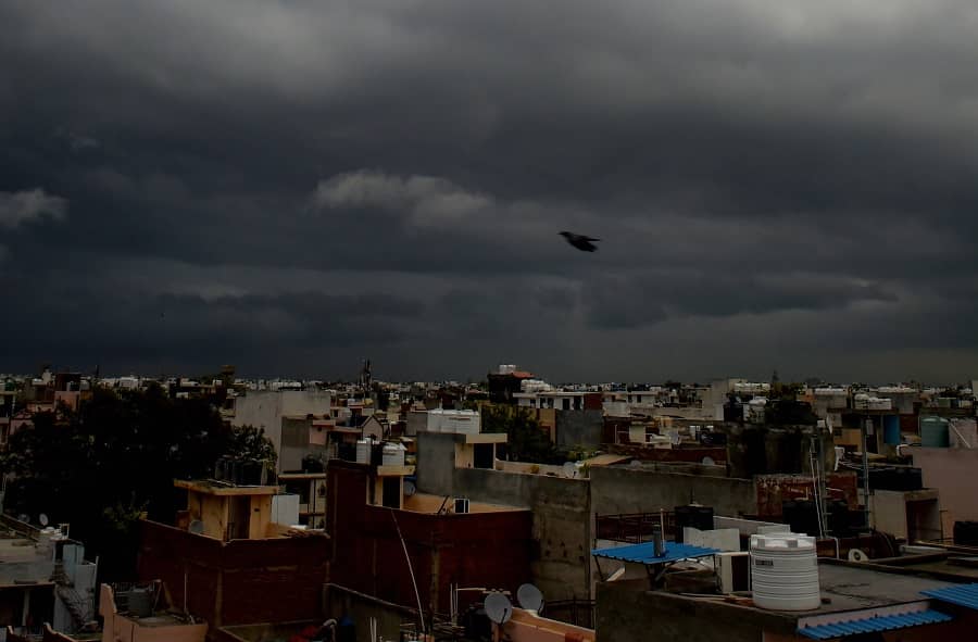Monsoon clouds hover in the sky in New Delhi on Tuesday