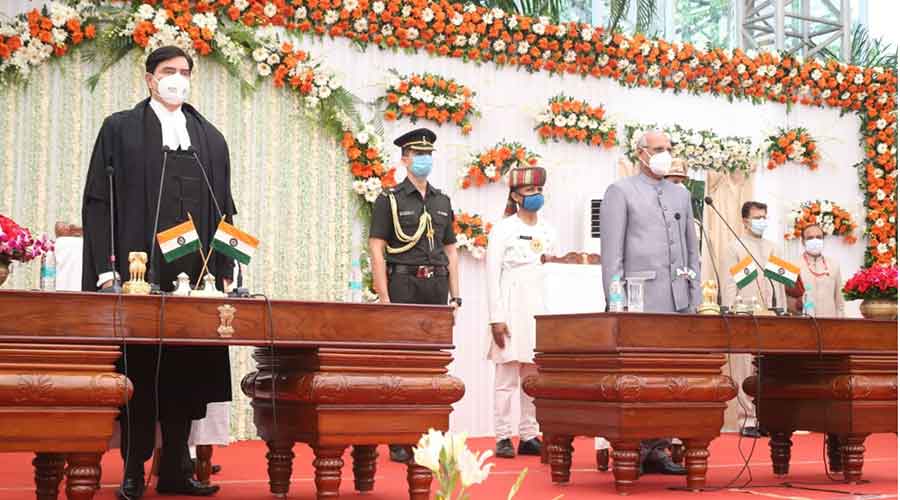 Chief justice Rajiv Ranjan with governor Ramesh Bais during the national anthem.