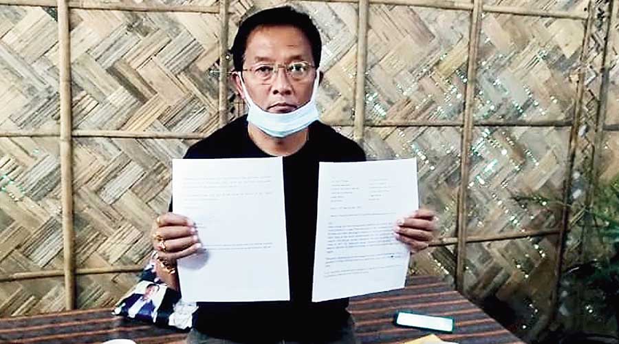 Binay Tamang with his resignation letter at his residence in Darjeeling on Thursday.