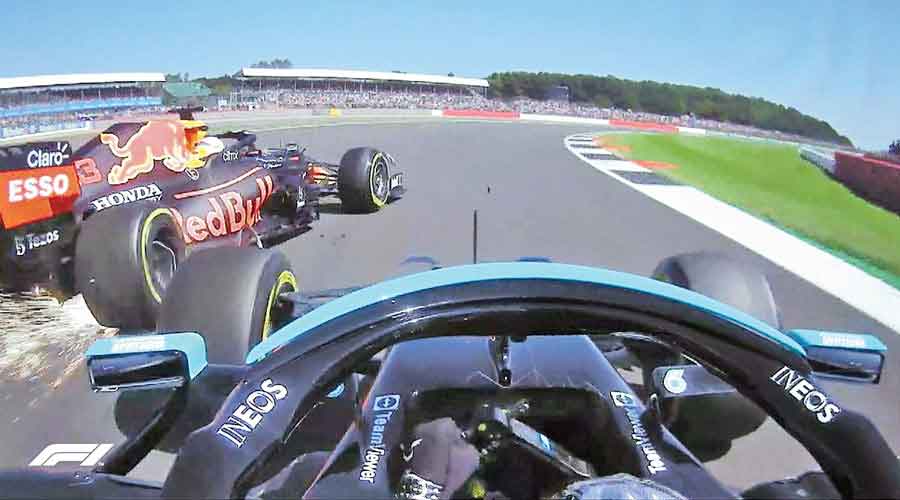 The moment of impact between Red Bull’s championship leader Max Verstappen and Mercedes’ Lewis Hamilton during the British GP on Sunday. 