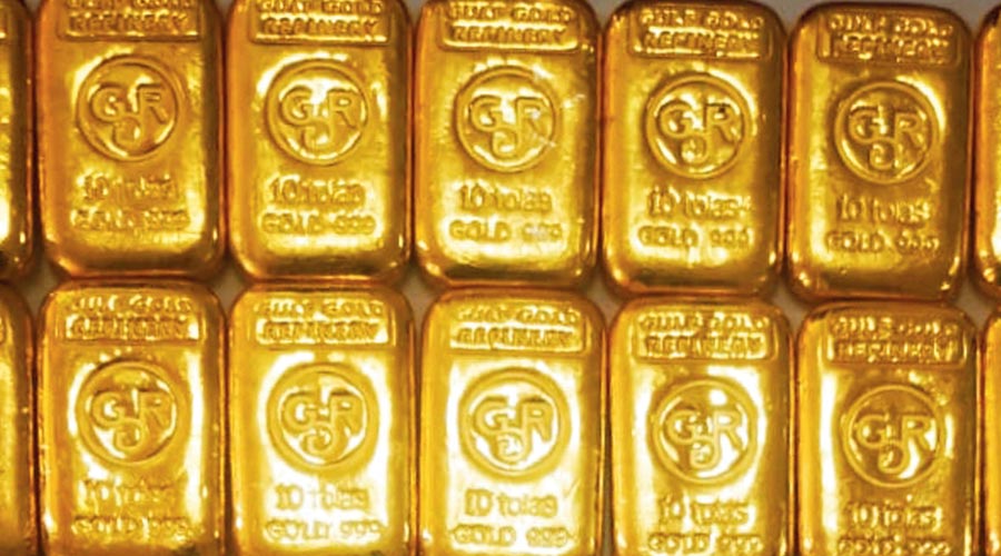 Some of the seized gold biscuits at Petrapole on Monday. 