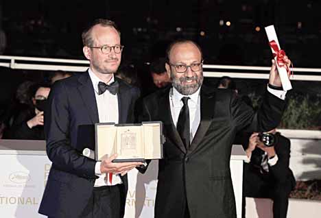 Film-makers Juho Kuosmanen (left) and Asghar Farhadi who shared the Grand Prix