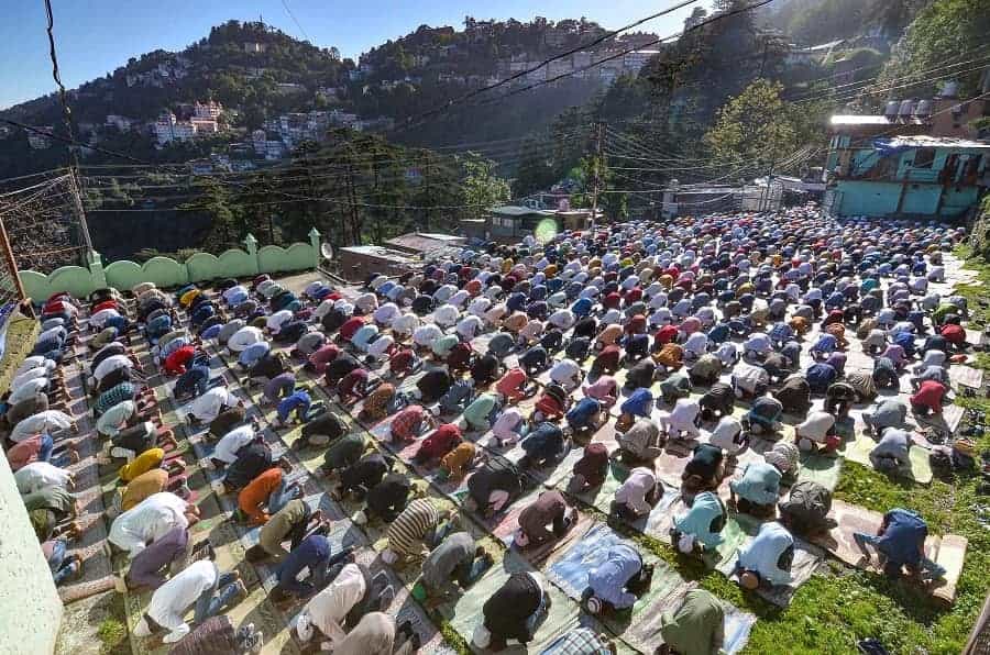 Muslim devotees offers Eid-al-Adha prayer at Lakkar Bazar in Shimla on Wednesday.