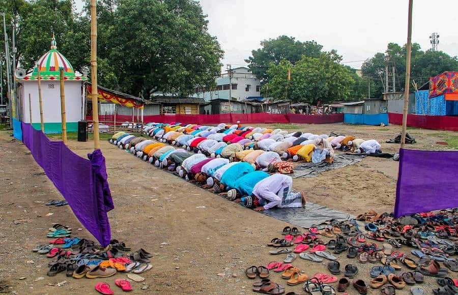 Devotees offer prayers at Eidgah maidan near Balurghat on Wednesday.