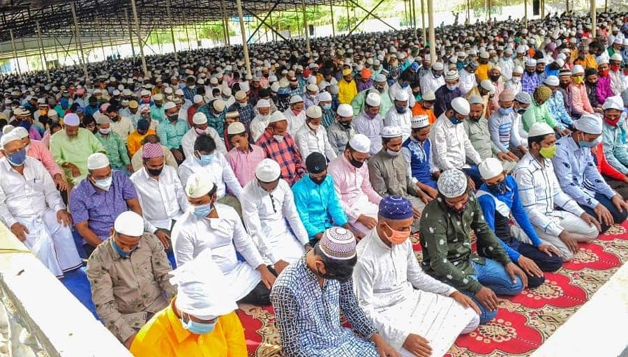 Muslims offer prayers at a market, in Coimbatore on Wednesday.