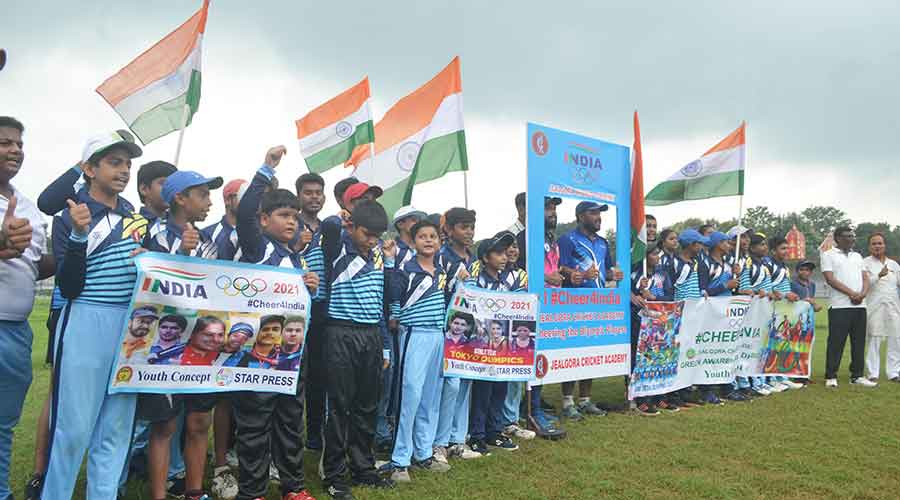 Students and coaches of Jealgora cricket academy cheers up to the Indian Olympic team at Jealgora Stadium of BCCL at Jharia on Friday.
