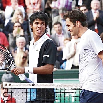 Somdev Devvarman with Roger Federer