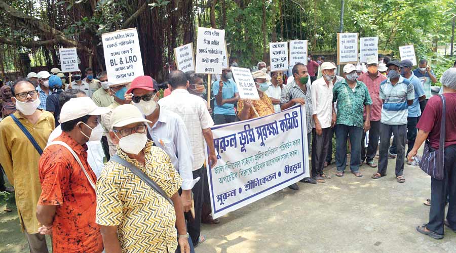 Residents of Bolpur and Santiniketan demonstrate in front of the land revenue office in Bolpur on Monday. 