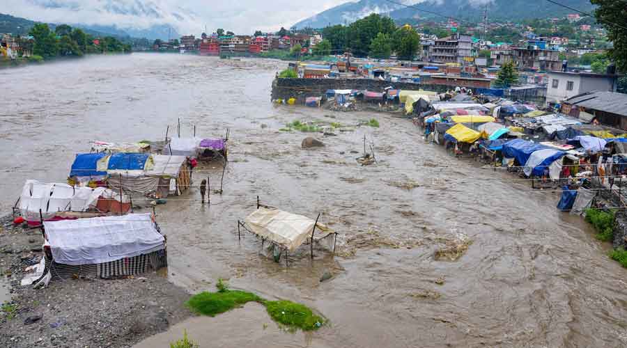 The water level of Beas river rises due to heavy rainfall in Kullu district, on Wednesday.