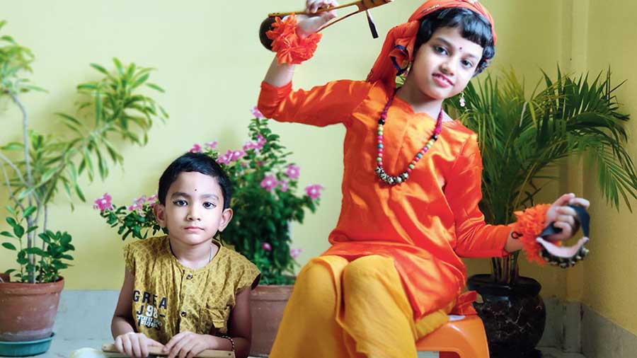 Krisav Makar, 3, and Madhura Adak, 7, perform to the poem Baul on the first evening. 