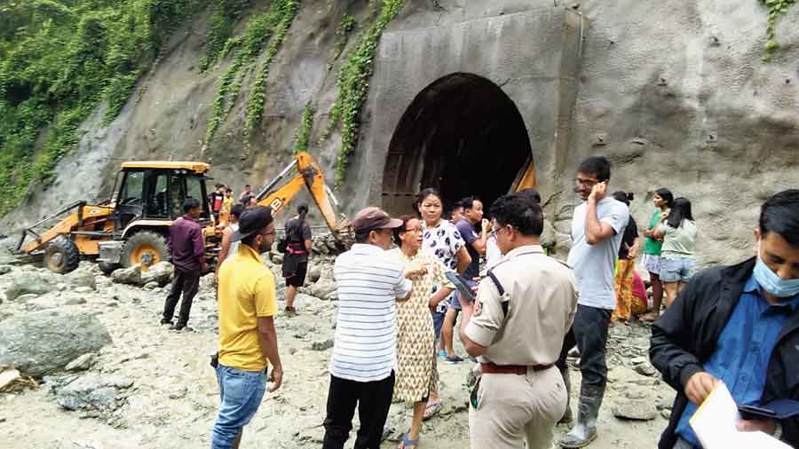 People stand at the spot of the mishap in Kalimpong district on Friday