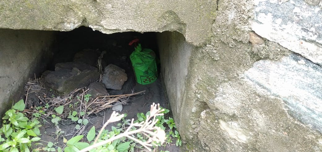 The IED under a culvert on the road in Khasmahal, Bokaro.